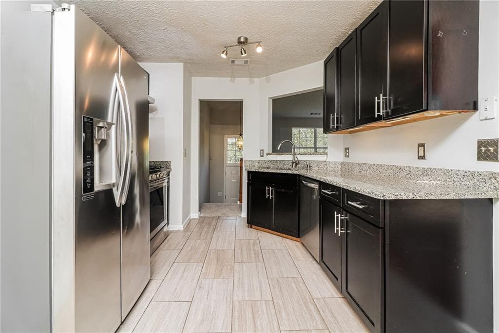 4 bedroom, 3 bathroom, 1,805 sq ft single family residence for sale at 3579 Dyer Parke Lane, Marietta, GA 30060 — photo 5