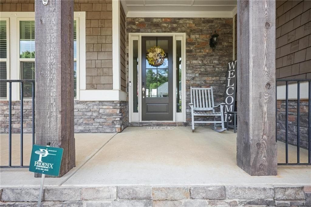 4 bedroom, 4 bathroom, 5,056 sq ft single family residence for sale at 322 Woodridge Pass, Canton, GA 30114 — photo 2