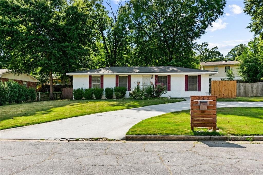 3 bedroom, 2 bathroom, 1,300 sq ft single family residence for sale at 740 Tara Circle, Atlanta, GA 30354 — photo 1 of 26