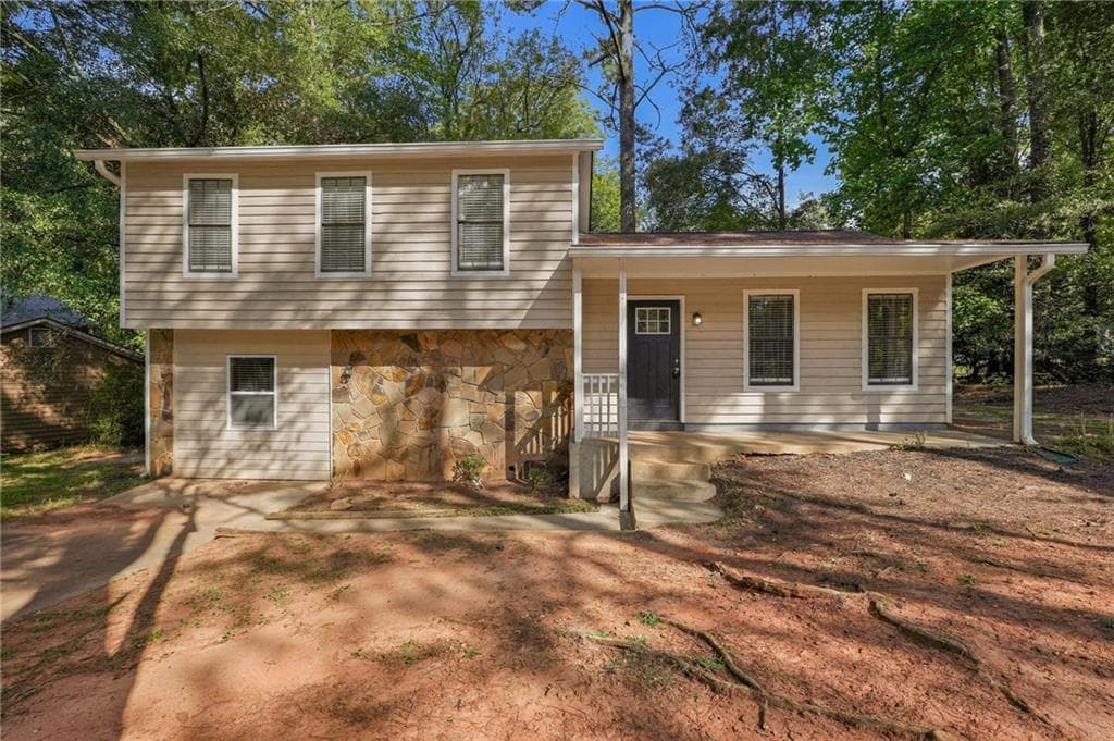 4 bedroom, 2 bathroom, 1,430 sq ft home for sale at 5130 S Woodbridge Trail, Stone Mountain, GA