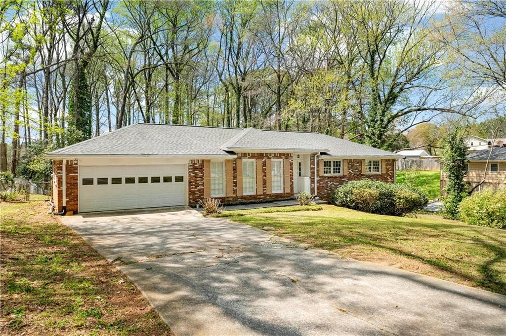 4 bedroom, 3 bathroom, 2,587 sq ft single family residence for sale at 155 King David Drive, Lilburn, GA 30047 — photo 2