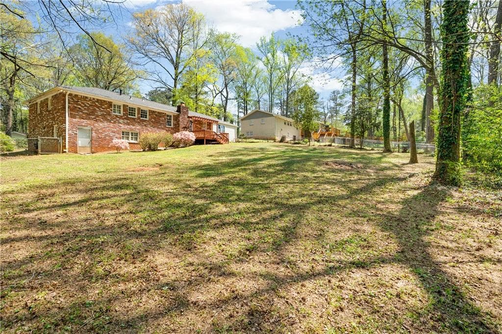 4 bedroom, 3 bathroom, 2,587 sq ft single family residence for sale at 155 King David Drive, Lilburn, GA 30047 — photo 4
