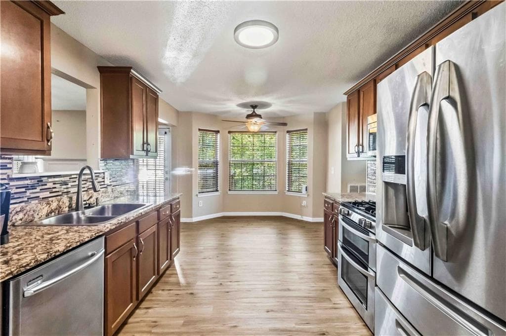 4 bedroom, 3 bathroom, 1,940 sq ft single family residence for sale at 2608 Micah Drive, Ellenwood, GA 30294 — photo 5