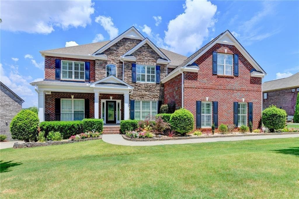 6 bedroom, 5 bathroom, 6,377 sq ft single family residence for sale at 2825 Waterstone Drive, Cumming, GA 30041