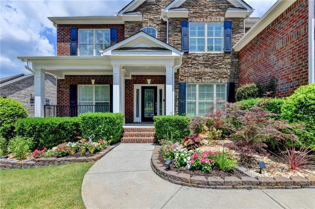 6 bedroom, 5 bathroom, 6,377 sq ft single family residence for sale at 2825 Waterstone Drive, Cumming, GA 30041 — photo 3