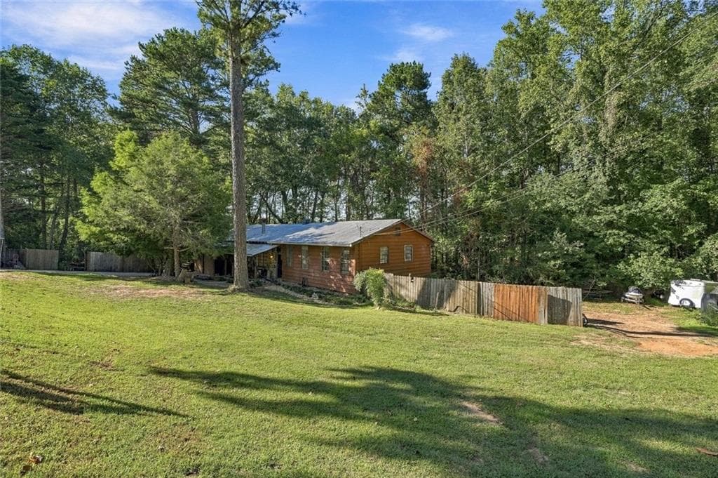 4 bedroom, 3 bathroom single family residence for sale at 6430 Pine Ridge Circle, Cumming, GA 30041 — photo 2