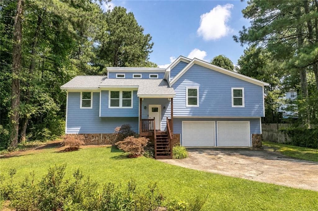 4 bedroom, 2 bathroom, 2,016 sq ft single family residence for sale at 2486 Sawmill Road, Marietta, GA 30064 — photo 2