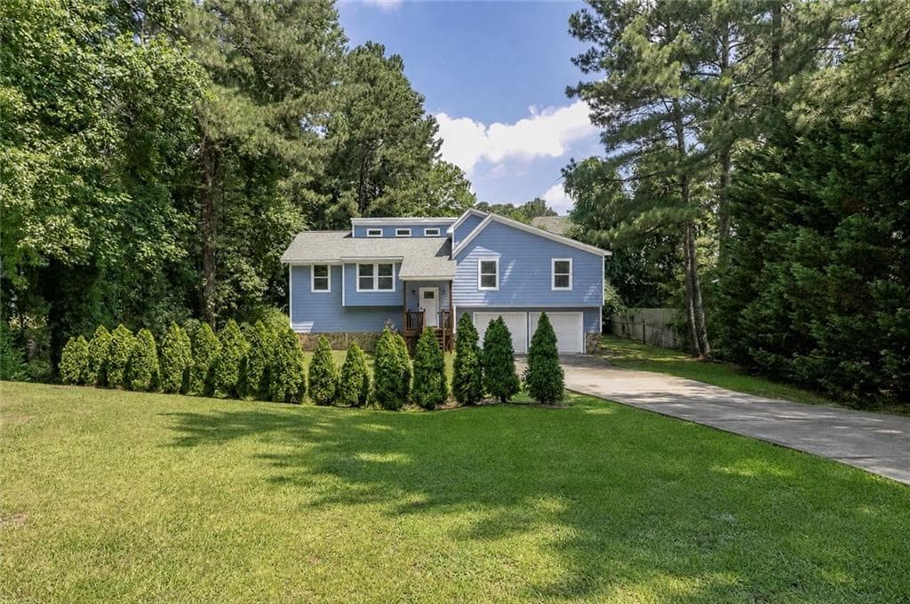 4 bedroom, 2 bathroom, 2,016 sq ft single family residence for sale at 2486 Sawmill Road, Marietta, GA 30064 — photo 3