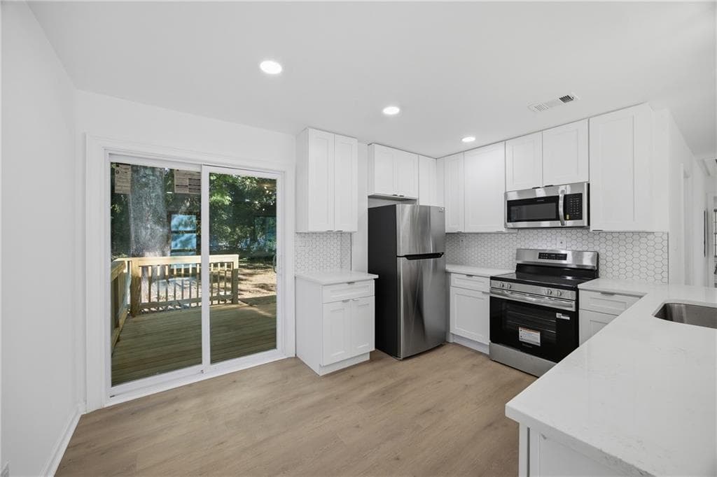 3 bedroom, 2 bathroom, 1,012 sq ft single family residence for sale at 2184 Browns Mill Road, Atlanta, GA 30315 — photo 4
