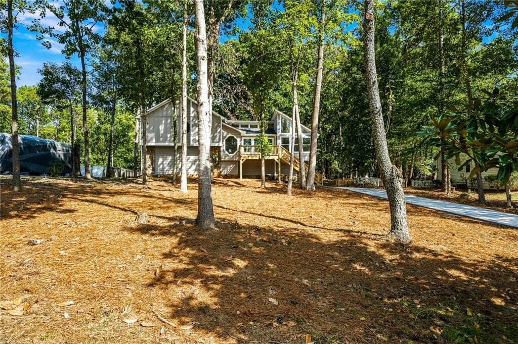 5 bedroom, 4 bathroom, 4,066 sq ft single family residence for sale at 745 Cedar Creek Way, Woodstock, GA 30189 — photo 2