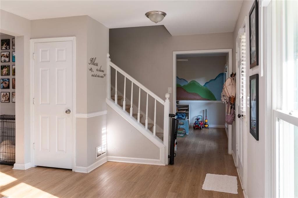 4 bedroom, 3 bathroom, 2,460 sq ft single family residence for sale at 4985 Bent Creek Court, Sugar Hill, GA 30518 — photo 2