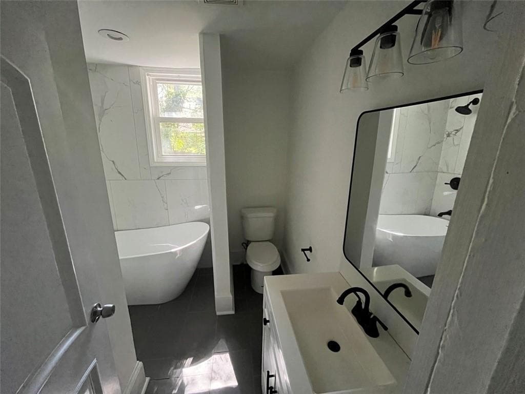 4 bedroom, 2 bathroom, 1,200 sq ft single family residence for sale at 1712 Evans Drive, Atlanta, GA 30310 — photo 8