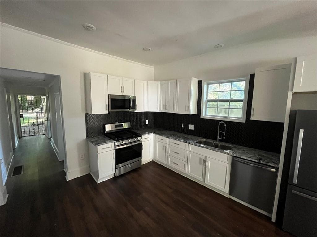 4 bedroom, 2 bathroom, 1,200 sq ft single family residence for sale at 1712 Evans Drive, Atlanta, GA 30310 — photo 10