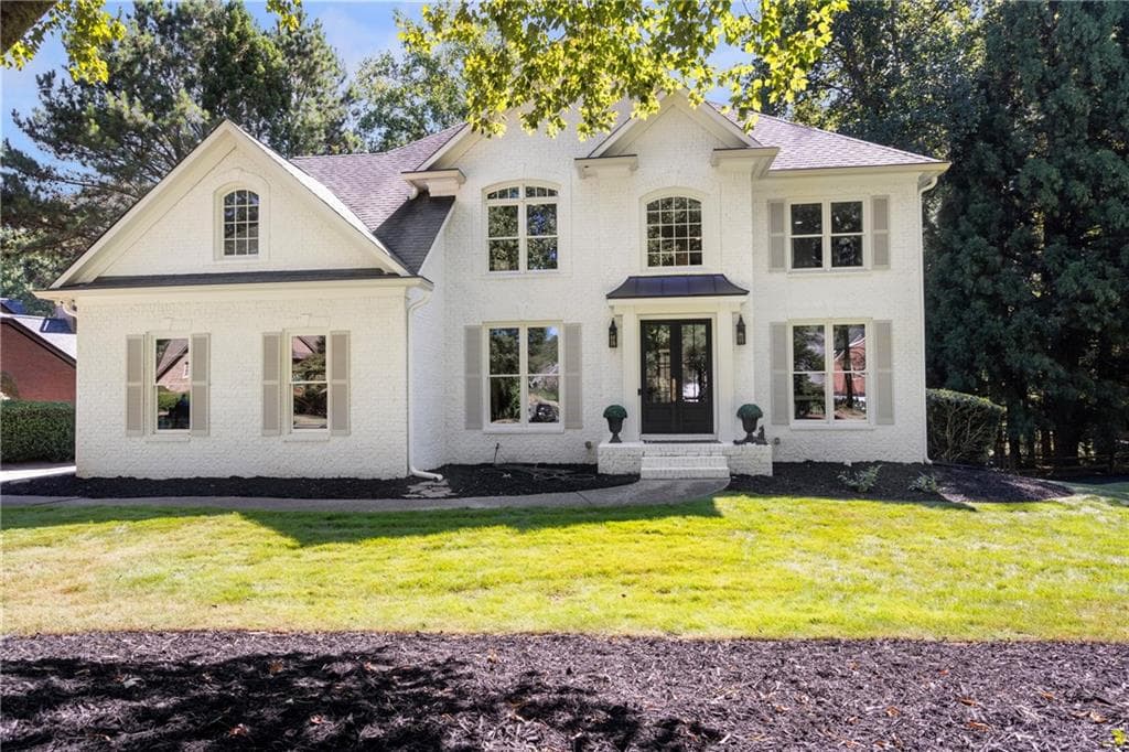 6 bedroom, 3 bathroom, 3,868 sq ft single family residence for sale at 162 Grand Avenue, Suwanee, GA 30024