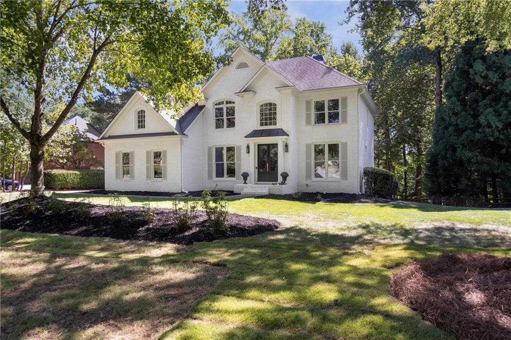 6 bedroom, 3 bathroom, 3,868 sq ft single family residence for sale at 162 Grand Avenue, Suwanee, GA 30024 — photo 4