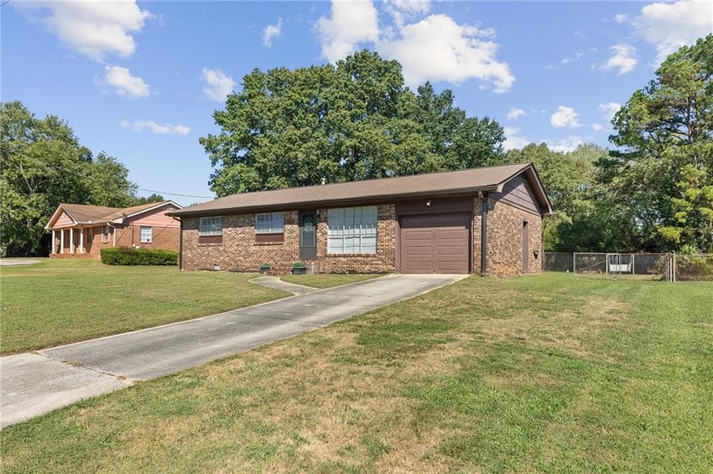 3 bedroom, 2 bathroom, 1,040 sq ft single family residence for sale at 1064 Meadowbrook Lane, Conyers, GA 30012 — photo 2