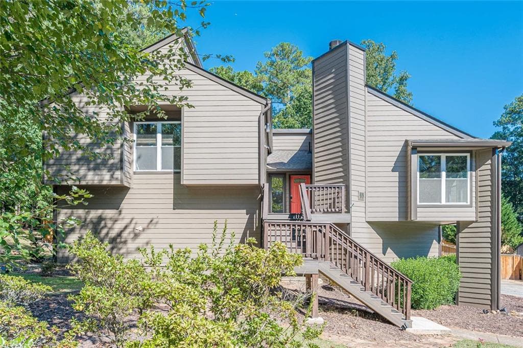 4 bedroom, 3 bathroom, 2,579 sq ft single family residence for sale at 2220 Rock Ridge Road, Marietta, GA 30062 — photo 2