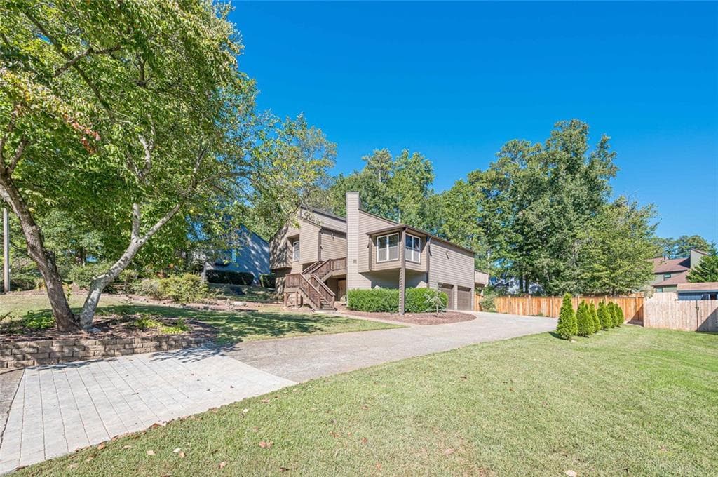 4 bedroom, 3 bathroom, 2,579 sq ft single family residence for sale at 2220 Rock Ridge Road, Marietta, GA 30062 — photo 3