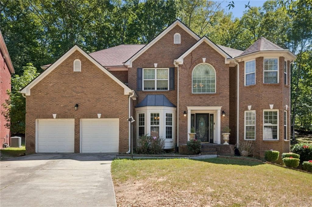 7 bedroom, 5 bathroom, 5,452 sq ft single family residence for sale at 7627 Waterlace Drive, Fairburn, GA 30213