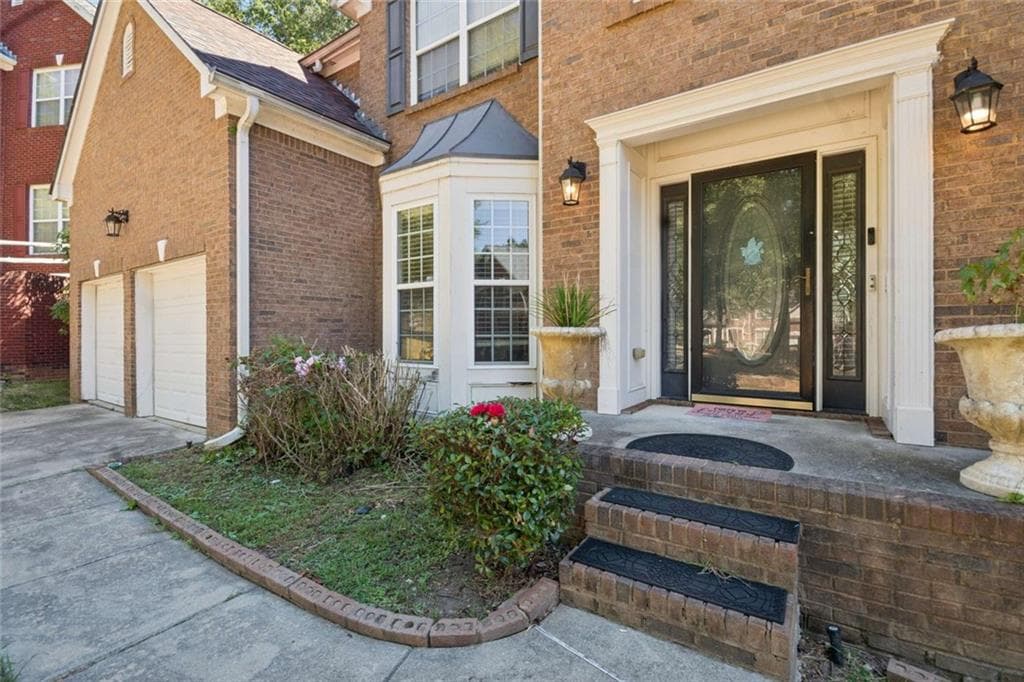 7 bedroom, 5 bathroom, 5,452 sq ft single family residence for sale at 7627 Waterlace Drive, Fairburn, GA 30213 — photo 3