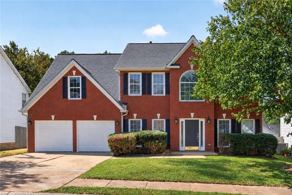 4 bedroom, 3 bathroom, 2,585 sq ft single family residence for sale at 1312 Woodland View Road, Lawrenceville, GA 30043