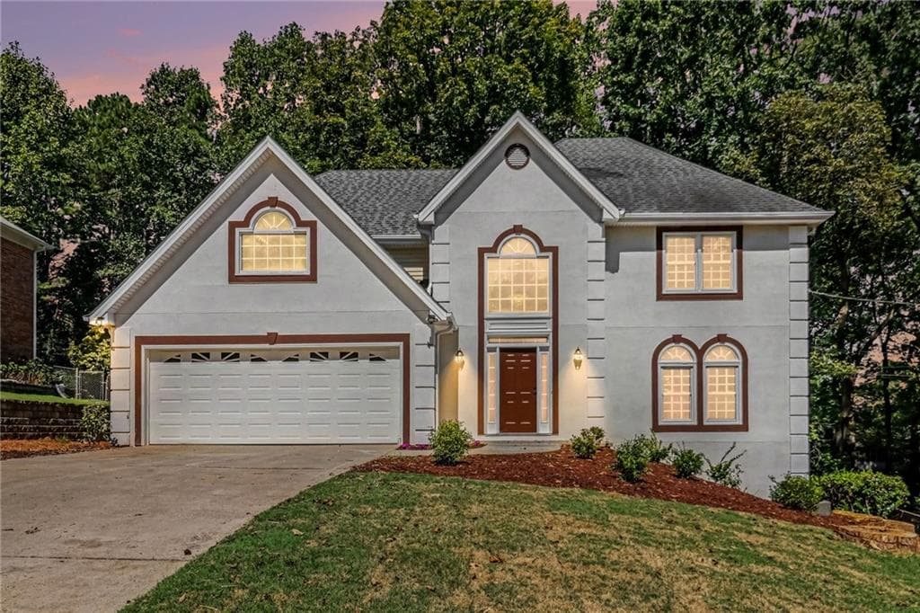 5 bedroom, 4 bathroom, 3,980 sq ft single family residence for sale at 1419 Dunsford Circle, Suwanee, GA 30024 — photo 2