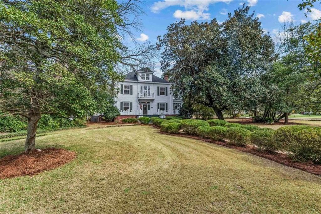 5 bedroom, 3 bathroom, 4,642 sq ft single family residence for sale at 301 N East Street, Greensboro, GA 30642 — photo 5
