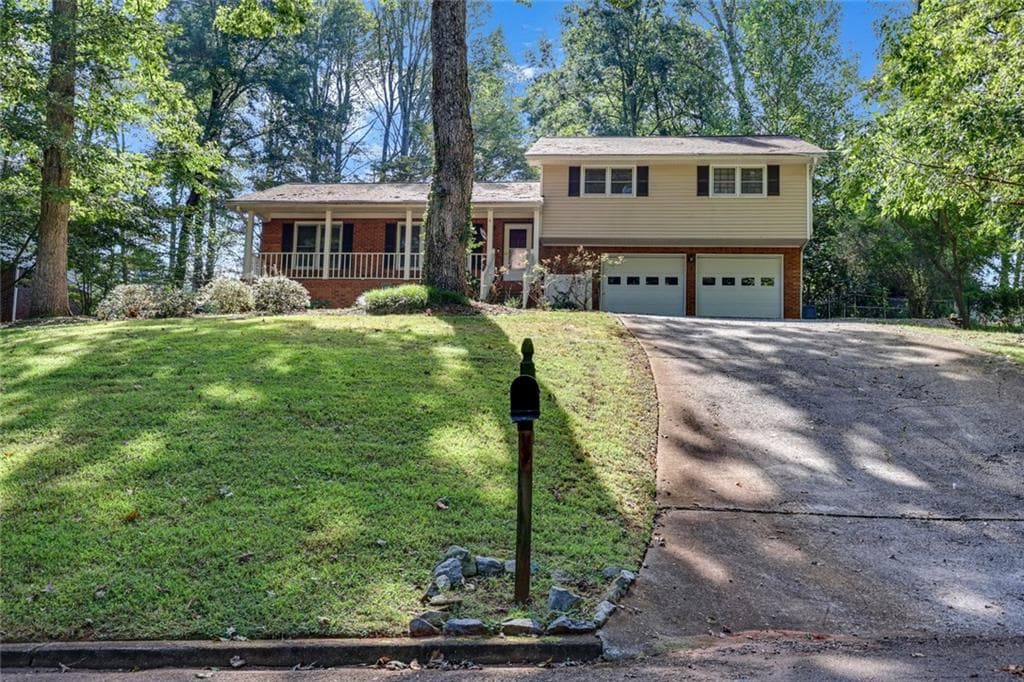 3 bedroom, 2 bathroom, 2,487 sq ft single family residence for sale at 5728 Four Winds Court, Lilburn, GA 30047
