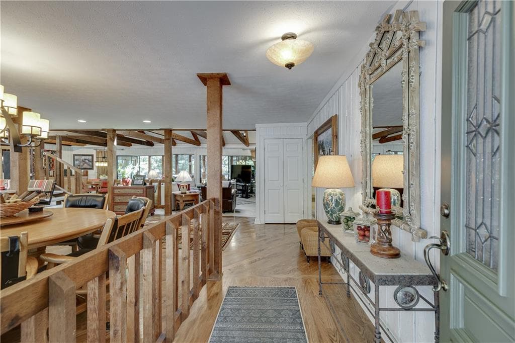 7 bedroom, 4 bathroom, 6,198 sq ft single family residence for sale at 7565 Shadburn Ferry Road, Cumming, GA 30041 — photo 4