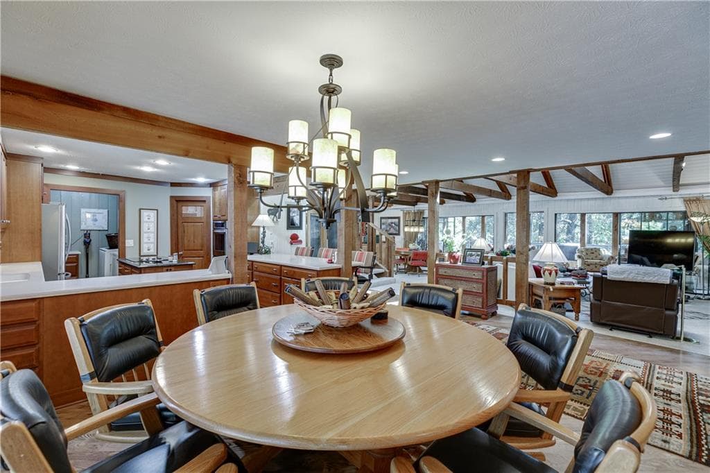 7 bedroom, 4 bathroom, 6,198 sq ft single family residence for sale at 7565 Shadburn Ferry Road, Cumming, GA 30041 — photo 6