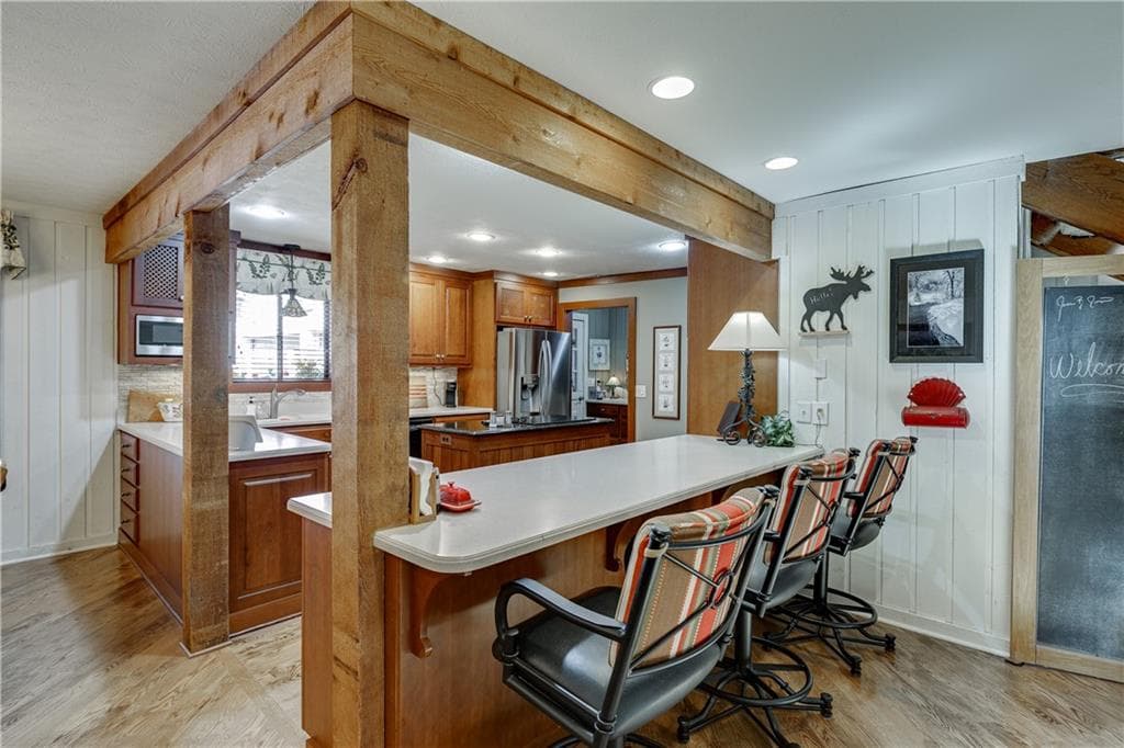 7 bedroom, 4 bathroom, 6,198 sq ft single family residence for sale at 7565 Shadburn Ferry Road, Cumming, GA 30041 — photo 7