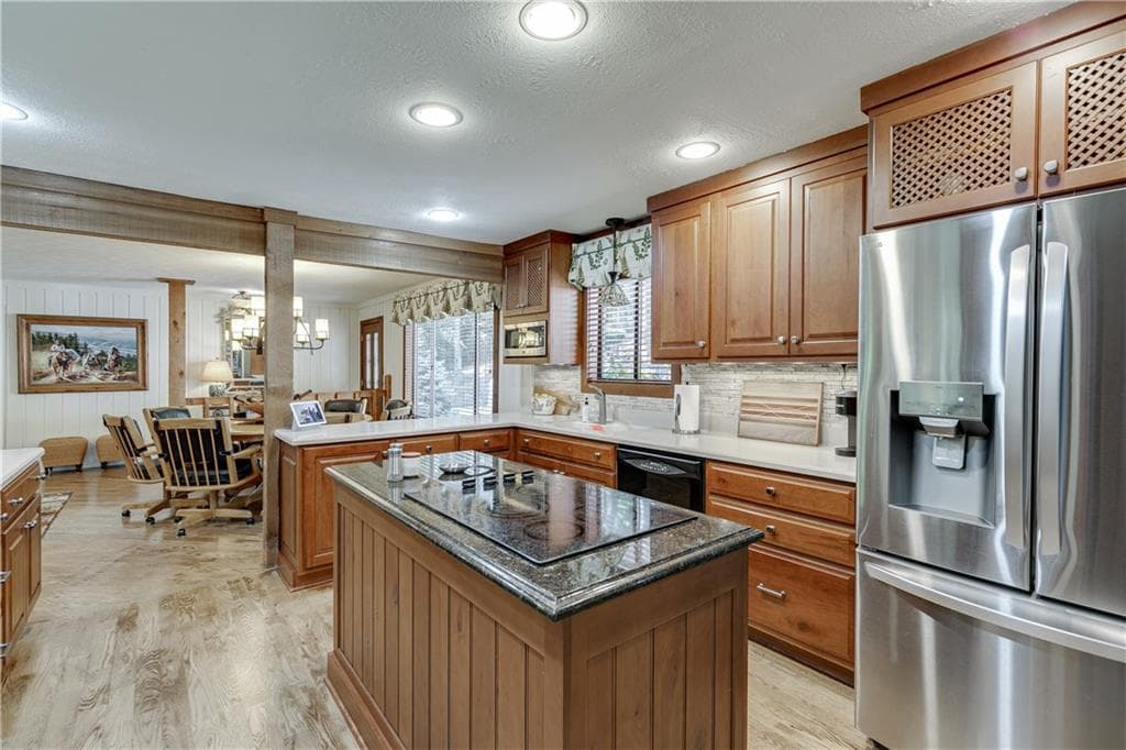 7 bedroom, 4 bathroom, 6,198 sq ft single family residence for sale at 7565 Shadburn Ferry Road, Cumming, GA 30041 — photo 10