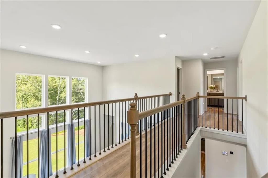 5 bedroom, 4 bathroom, 3,072 sq ft single family residence for sale at 8590 Oak Hollow Way, Cumming, GA 30041 — photo 8