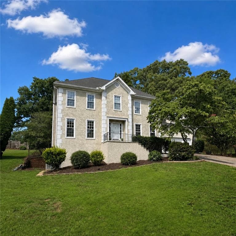 5 bedroom, 4 bathroom, 3,974 sq ft single family residence for sale at 610 Adam Circle, Woodstock, GA 30188 — photo 2