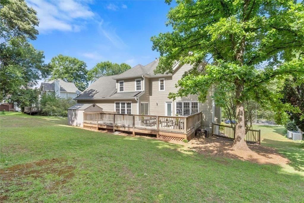 5 bedroom, 4 bathroom, 3,974 sq ft single family residence for sale at 610 Adam Circle, Woodstock, GA 30188 — photo 7