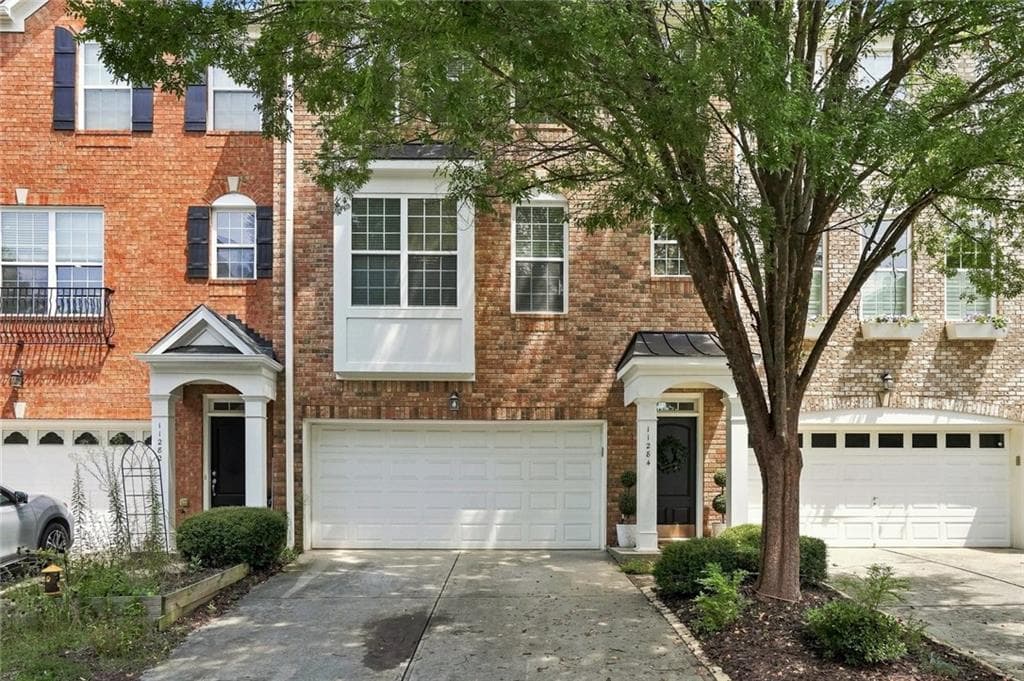 4 bedroom, 3 bathroom, 2,488 sq ft townhouse for sale at 11284 Musette Circle, Alpharetta, GA 30009