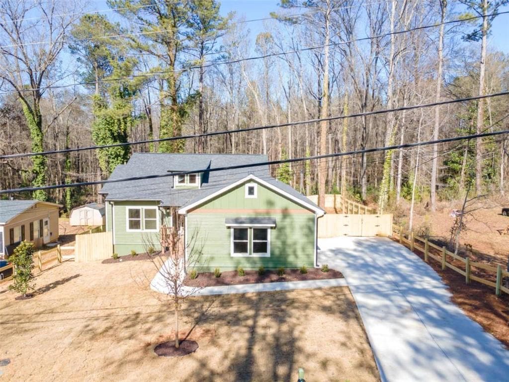 3 bedroom, 2 bathroom, 1,438 sq ft single family residence for sale at 6138 Green Acres Drive, Covington, GA 30014 — photo 2
