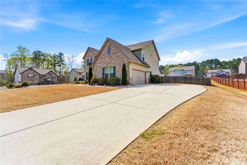 5 bedroom, 4 bathroom, 3,496 sq ft single family residence for sale at 801 Relic Ridge, Hampton, GA 30228 — photo 2