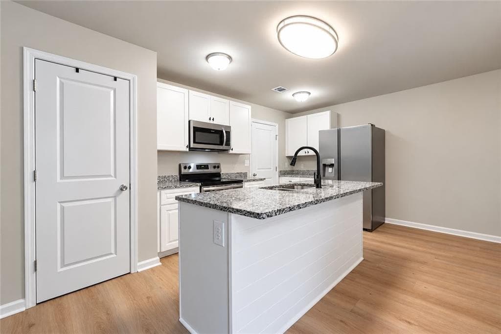4 bedroom, 3 bathroom, 1,850 sq ft single family residence for sale at 480 McGiboney Lane, Covington, GA 30016 — photo 5