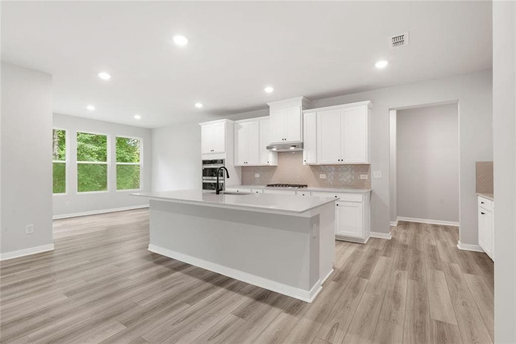 5 bedroom, 4 bathroom, 3,704 sq ft single family residence for sale at 405 Amberleaf Cove, Mcdonough, GA 30252 — photo 8