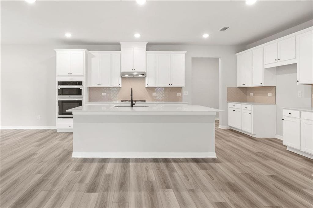 5 bedroom, 4 bathroom, 3,704 sq ft single family residence for sale at 405 Amberleaf Cove, Mcdonough, GA 30252 — photo 9
