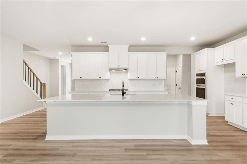 6 bedroom, 5 bathroom, 3,829 sq ft single family residence for sale at 401 Amberleaf Cove, Mcdonough, GA 30252 — photo 6