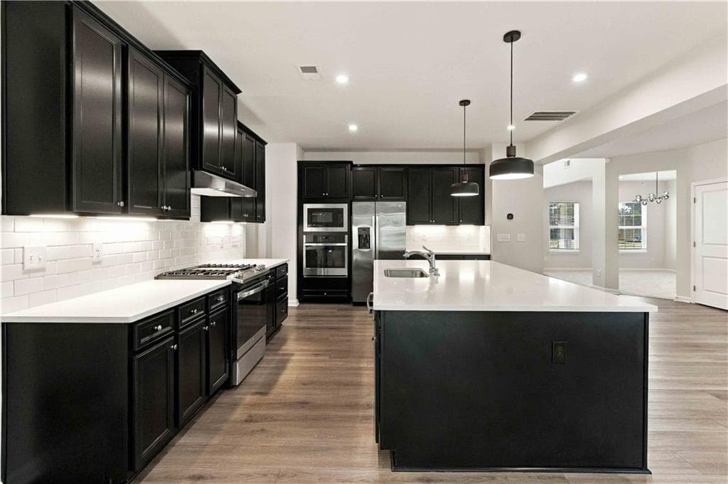 5 bedroom, 4 bathroom, 3,762 sq ft single family residence for sale at 140 Marchmont Drive, Locust Grove, GA 30248 — photo 2