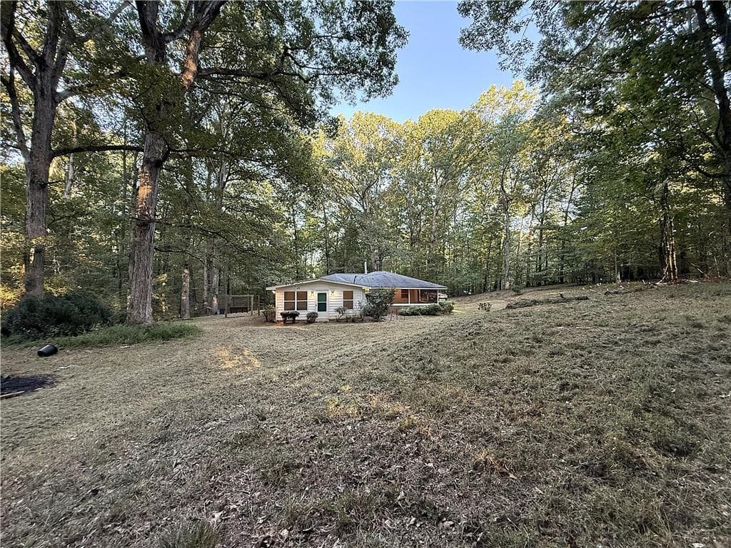 3 bedroom, 2 bathroom, 1,508 sq ft single family residence for sale at 3055 Longstreet Road, Milton, GA 30004 — photo 5