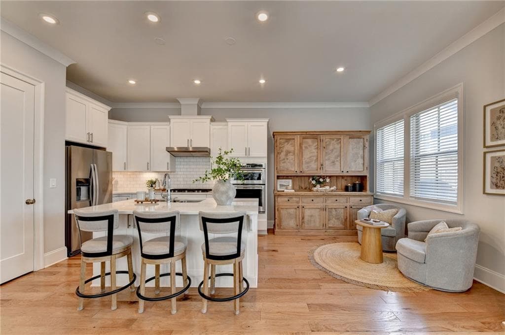 4 bedroom, 4 bathroom, 3,134 sq ft single family residence for sale at 4117 Stourbridge Common Circle, Milton, GA 30004 — photo 2