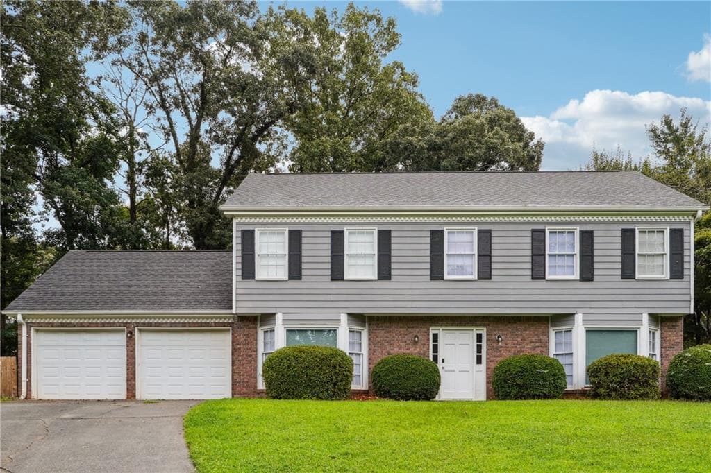 4 bedroom, 3 bathroom, 2,464 sq ft single family residence for sale at 1416 Manchester Court, Lilburn, GA 30047