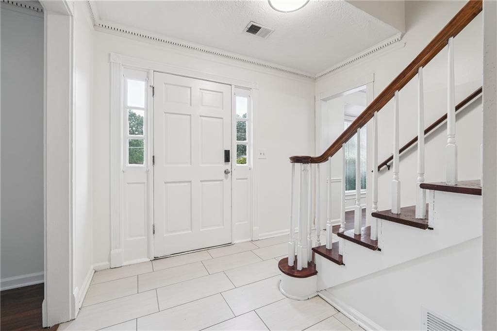4 bedroom, 3 bathroom, 2,464 sq ft single family residence for sale at 1416 Manchester Court, Lilburn, GA 30047 — photo 3
