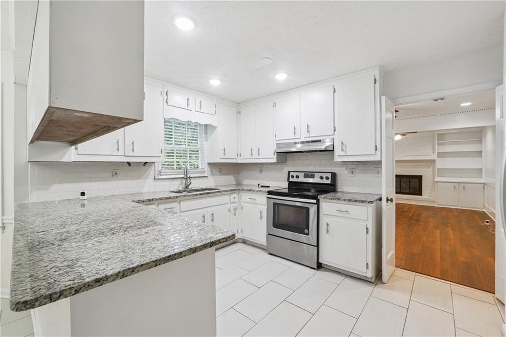 4 bedroom, 3 bathroom, 2,464 sq ft single family residence for sale at 1416 Manchester Court, Lilburn, GA 30047 — photo 7