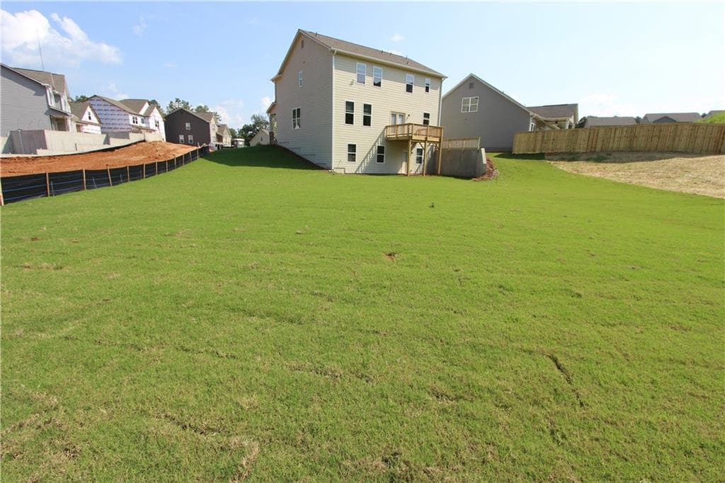 4 bedroom, 3 bathroom, 2,428 sq ft single family residence for sale at 7431 Rocklin Lane, Flowery Branch, GA 30542 — photo 3
