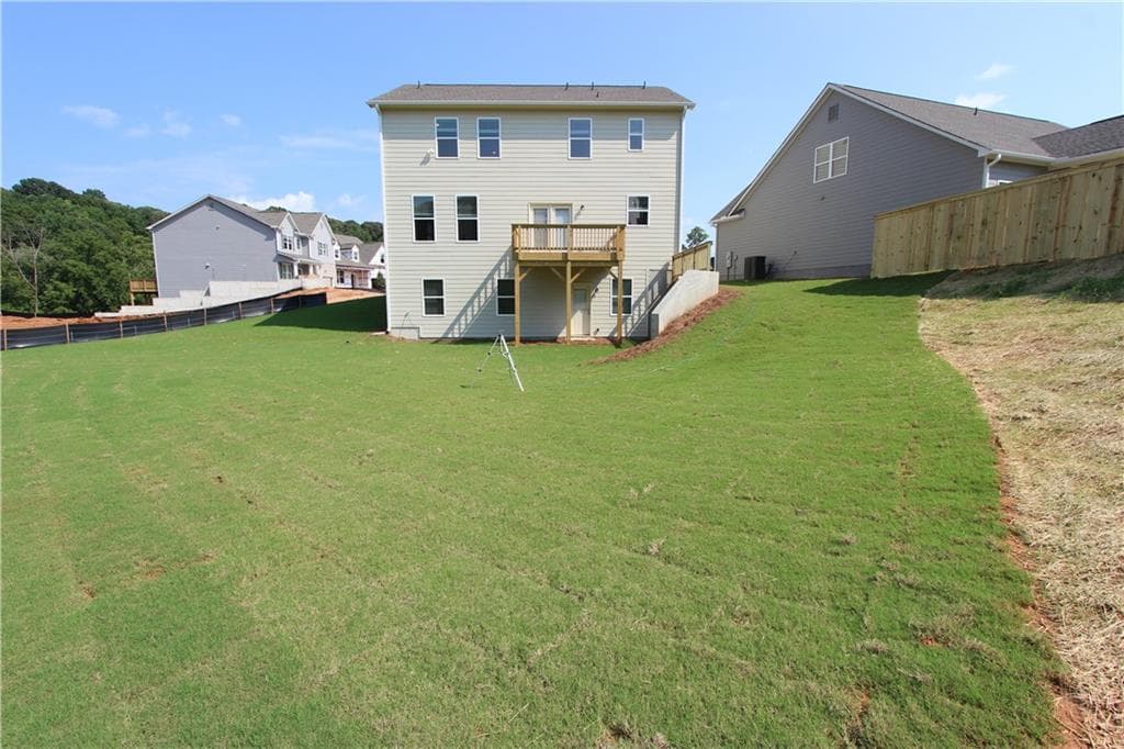 4 bedroom, 3 bathroom, 2,428 sq ft single family residence for sale at 7431 Rocklin Lane, Flowery Branch, GA 30542 — photo 4